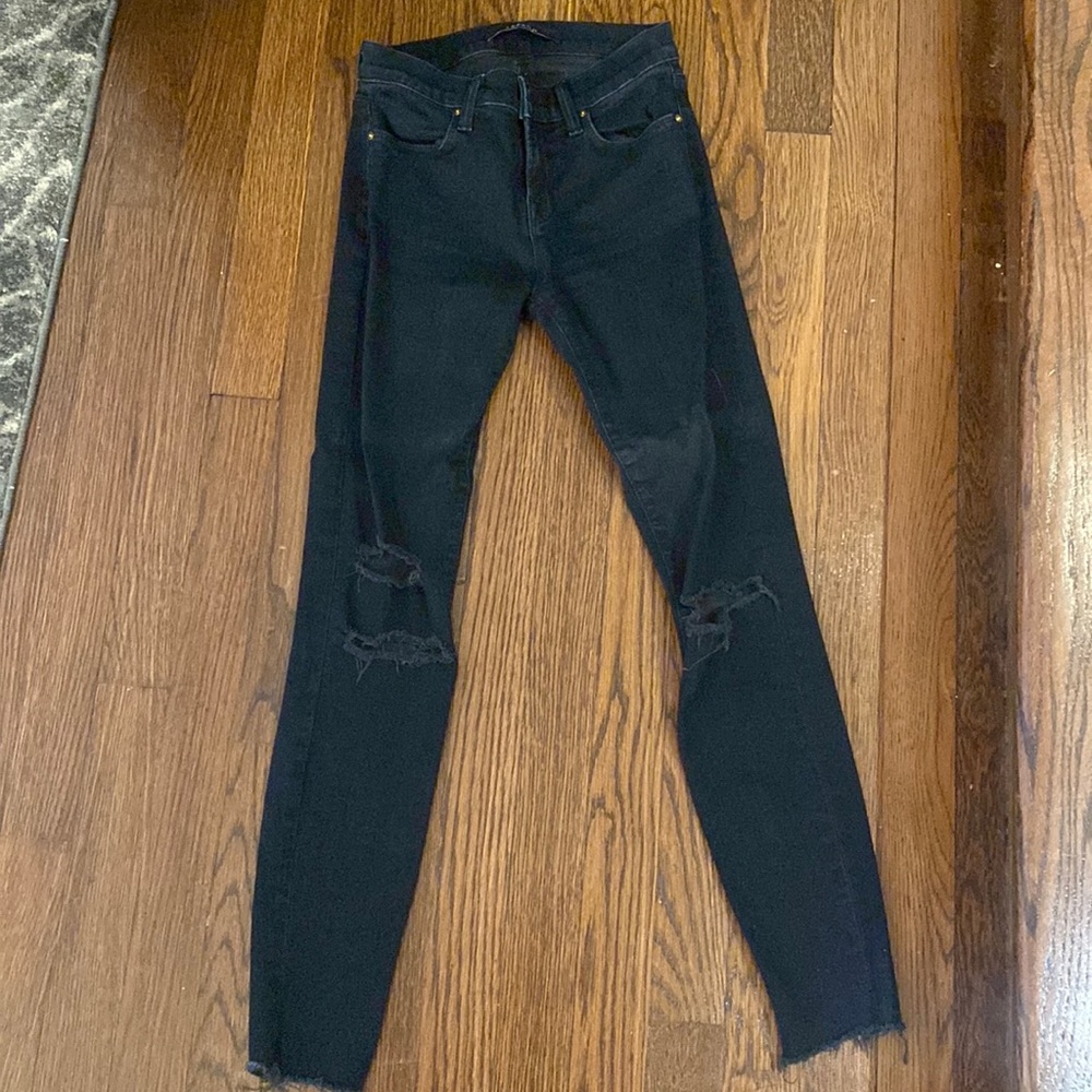 J brand blue jeans with rips on knees